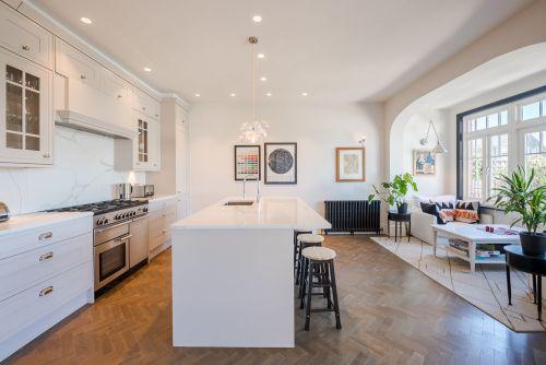 kitchen with island bench modern house in London available to hire for photoshoots and filming TV ads